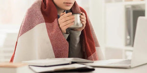 Comment restez au chaud dans un bureau froid ? - vetement chauffant
